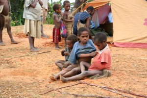 Natives inspection my tent at Bainu village